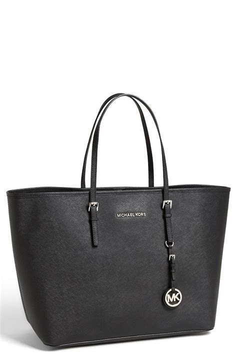 michael kors black purse jet set|Michael Kors jet set airplane.